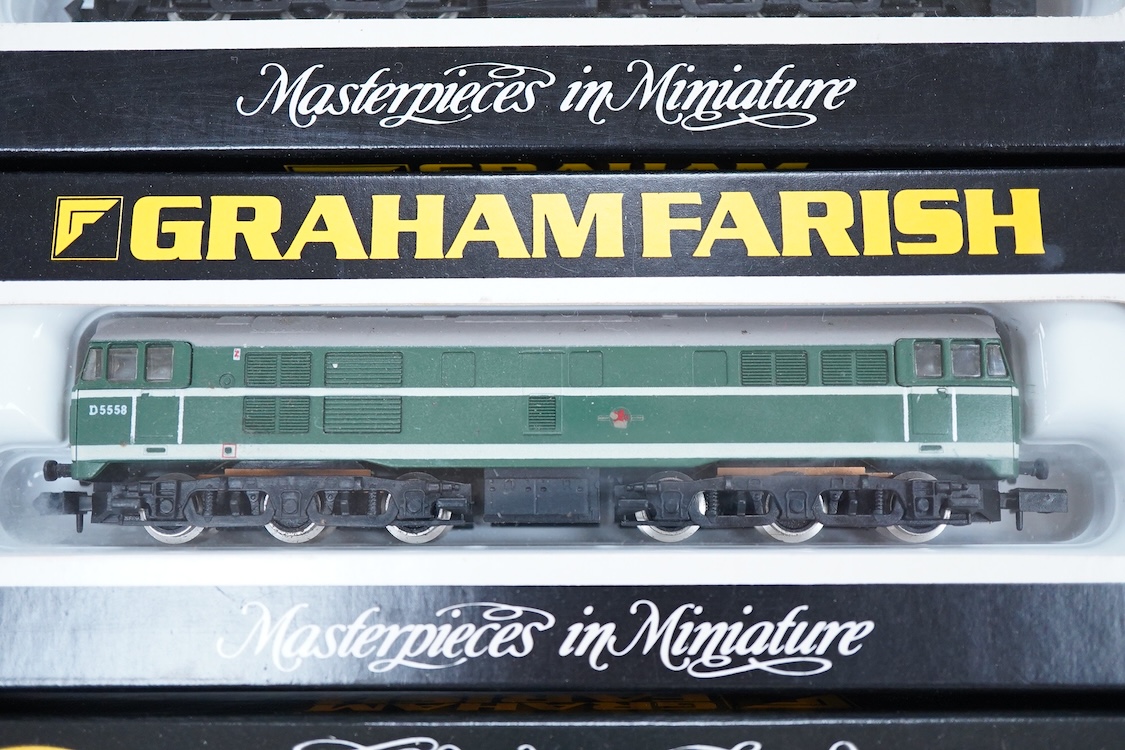 Four boxed Graham Farish N gauge railway diesel locomotives; a BR class 31, D5558 (8064), a Regional Railways class 31, Wigan Pier 31421 (8067), an EWS class 31, 31466, (806B) and a BR class 25, D7645 (8304).